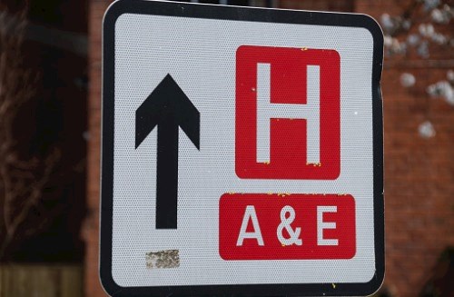 Roadsign pointing to hospital with Accident & Emergency department