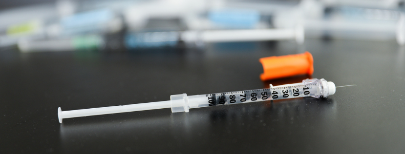Syringe on a table - Fentanyl opioid crisis
