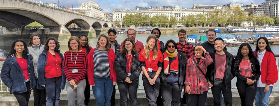 R&D team - a large group of people wearing various items of red clothing